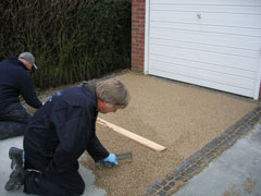 installing stone binder driveway